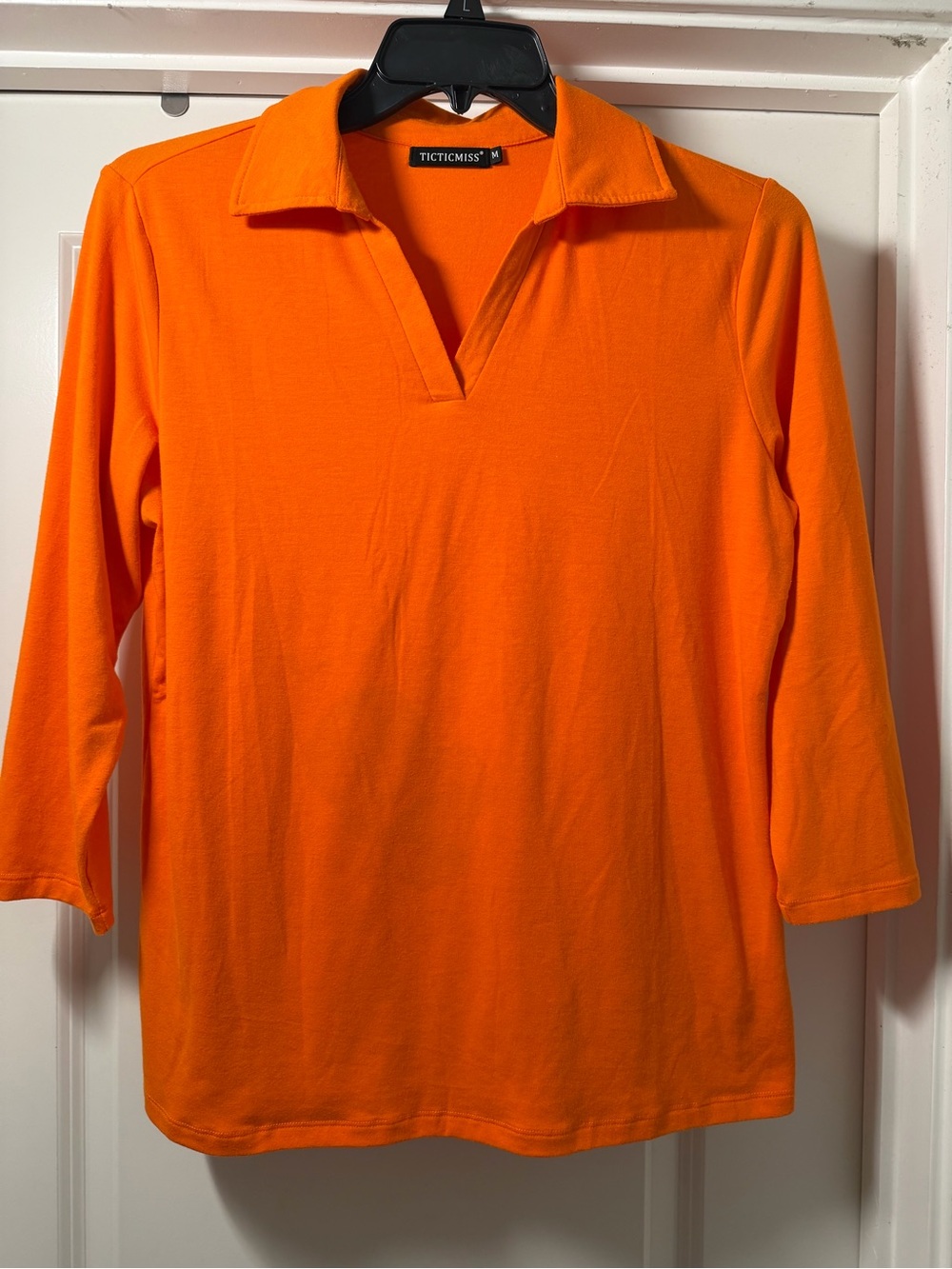Ticticmiss women’s size lg Orange Polo-Style Long Sleeve Shirt